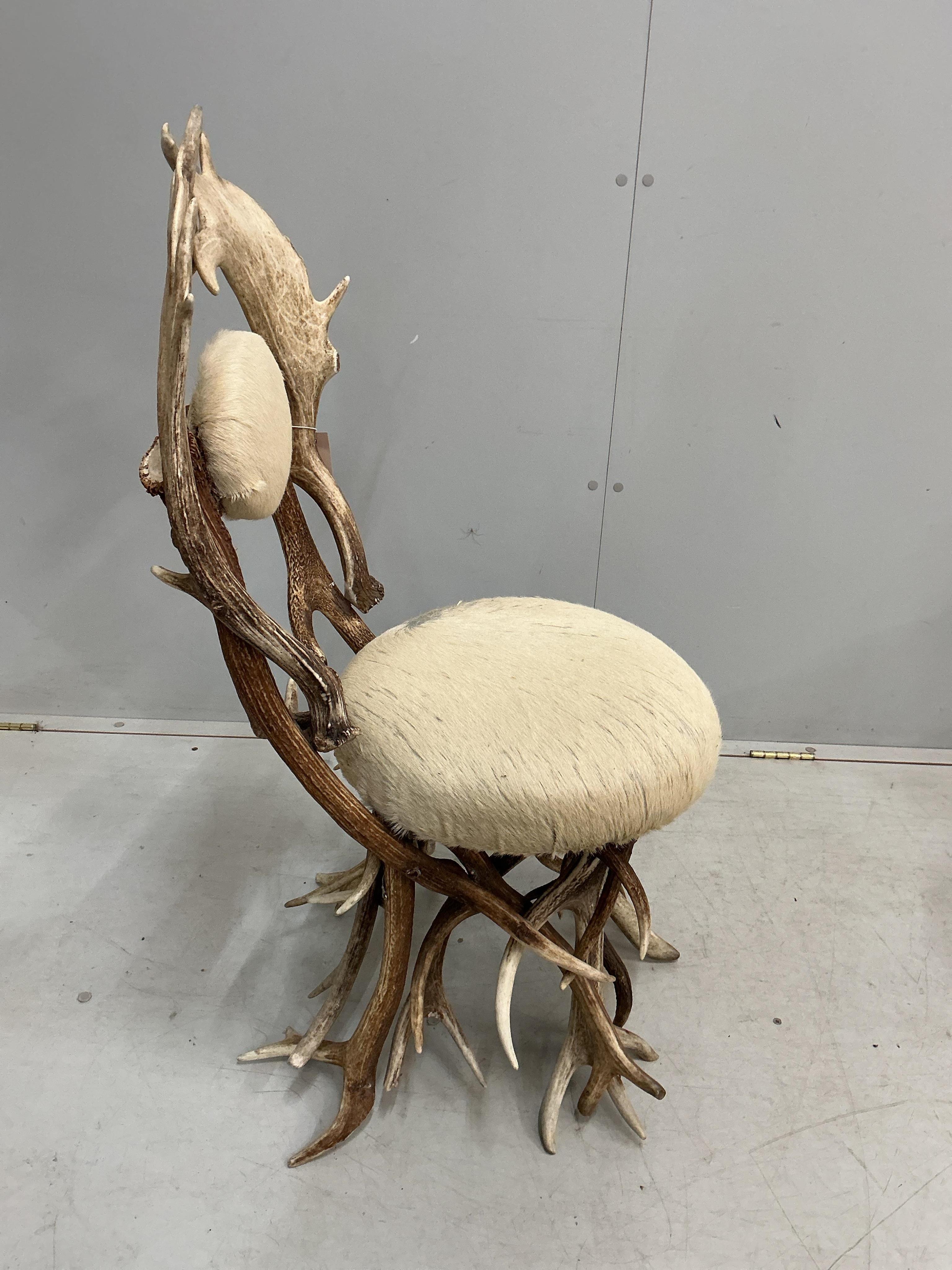 Danilo Shirato for Alps Atmosphere, Sarl, a pair of Italian ‘Fallen Antler’ side chairs with blond skin seats, width 50cm, depth 44cm, height 101cm
